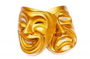 Traditional theatrical masks of Comedy and Tragedy